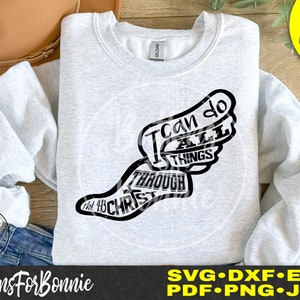 May include: A gray sweatshirt with a black graphic design of a running shoe with wings. The text "I can do all things through Christ" is written on the shoe.