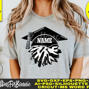 May include: A black and white graduation cap with the word "NAME" and the year "20XX" on it. The cap is over a design of a graduation cap with a tassel. The design is on a grey t-shirt.