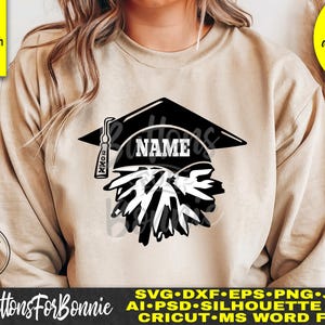 May include: Black and white graduation cap design with a 'NAME' text box and '20XX' text. The design is on a beige sweatshirt. The text 'Name & date can be changed!' is in a yellow box.