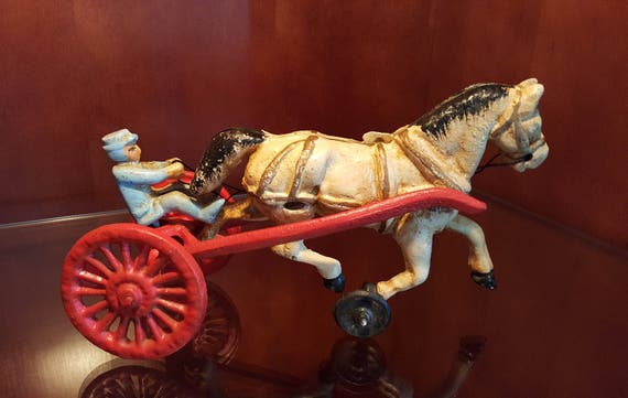 vintage cast iron horse and buggy toy