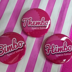 May include: Three pink round buttons with white lettering. Each button says "Bimbo Special Edition" in a stylized font.