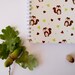 A5 spiral notebook with cute squirrels and lined pages, with original illustrations is a perfect gift idea for animal and nature lovers