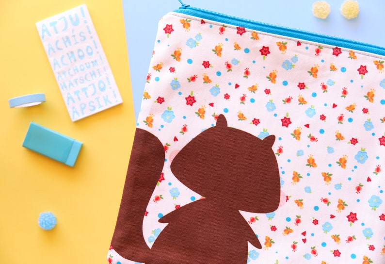 Cute squirrel pouch with flowers illustration