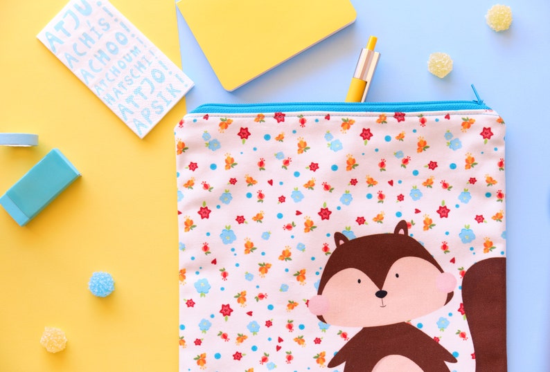 Cute squirrel pouch with flowers illustration