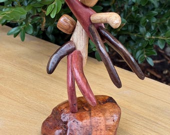 Ultimate Frisbee Sky’d Mini Sculpture on wood base made from figured Vermont Hardwood and pieces of sports equiptment