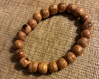 Whiskey Barrel besd bracelet repurposed from whiskey barrel staves and refinished with a repurposed floor finish