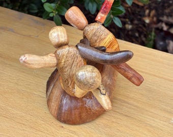 Soccer Kick Mini Sculpture on wood base made from figured Vermont Hardwood and pieces of sports equiptment