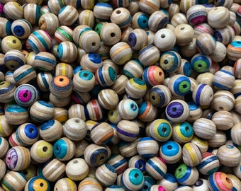 100 handmade skateboard deck beads . Beads 10mm from used skateboards