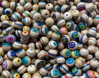 100 handmade skateboard deck beads . Beads 10mm from used skateboards