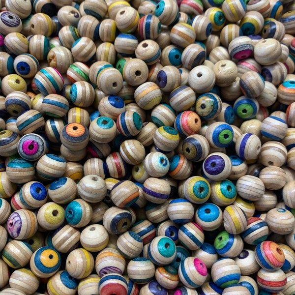 100 handmade skateboard deck beads . Beads 10mm from used skateboards