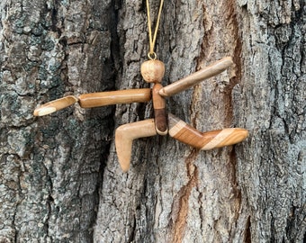 Ultimate Frisbee Ornament made from figured Vermont Hardwood and pieces of sports equiptment