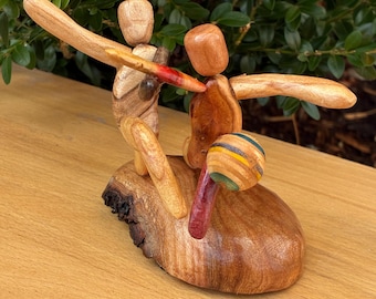 Soccer Kick Mini Sculpture on wood base made from figured Vermont Hardwood and pieces of sports equiptment