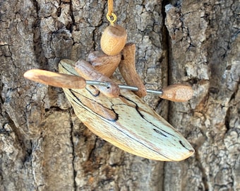 Kayaker Ornament made from Vermont native hardwoods. 4 1/2” and perfect as a window hanger