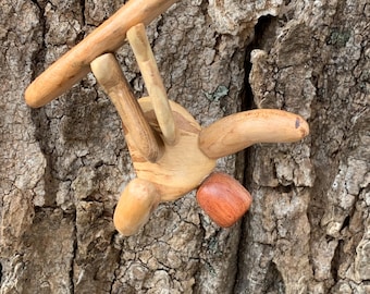 Snowboarder Ornament made from figured Vermont Hardwood and pieces of sports equiptment