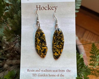Repurposed Boston Bruins TD Garden seat suspended in epoxy resin earrings. Stainless steel no nickel hardware