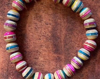 Skateboard bead bracelet repurposed from broken skateboard deck and refinished with a repurposed floor finish