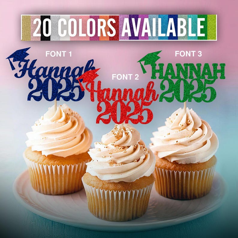 May include: Three cupcakes decorated with graduation themed toppers. The toppers are glittery and feature the name "Hannah" and the year "2025". The toppers are in three different fonts and colors: blue, red, and green.