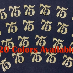 May include: A collection of twenty gold glitter 75s. The numbers are scattered on a dark blue background. 20 Colors Available.