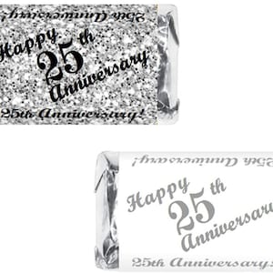 May include: Silver glitter favor boxes with the text "Happy 25th Anniversary" and "25th Anniversary!" printed in black.