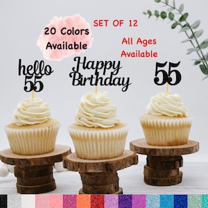 May include: Set of 12 cupcake toppers with black text that says "hello 55", "Happy Birthday", and "55". The toppers are on cupcakes with white frosting. The text "20 Colors Available" and "All Ages Available" is also visible in the image.