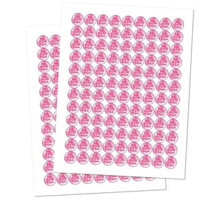 May include: Two sheets of white sticker paper with pink circles printed with the text "Baby It's Cold Outside".
