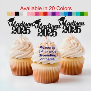 May include: Three cupcakes with black and white graduation themed toppers that say "Madison 2025". The toppers are 3-4 inches wide depending on the name. The cupcakes are frosted with white frosting and have gold sprinkles.
