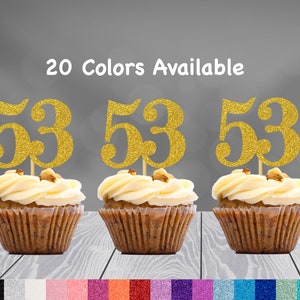 May include: Three cupcakes with gold glitter number 53 cake toppers. 20 Colors Available.