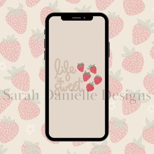 May include: A beige phone background with the text "life is sweet" in brown script. The background is decorated with a pattern of pink strawberries on a cream background.