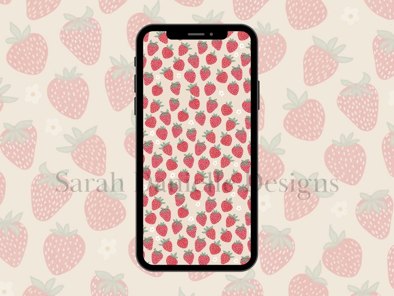 May include: A digital phone screen displaying a pattern of pink and red strawberries on a cream background. The text "Sarah Ann Designs" is visible at the bottom of the screen.