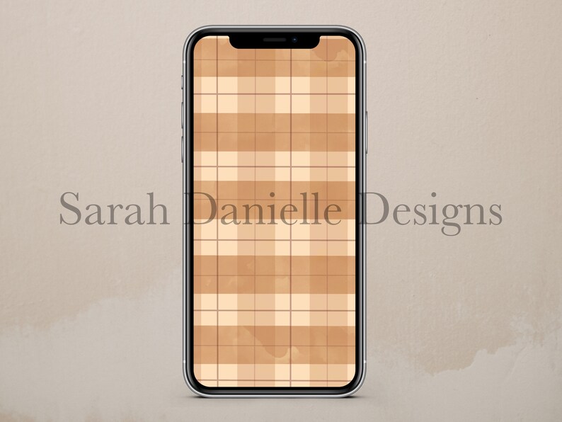 May include: A digital phone screen with a brown and white plaid pattern.