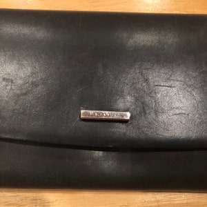 Cartera vintage Bally hecha en Italia cuero negro billetera larga plegable Bally billetera ranuras para tarjetas de crédito compartimento de billetes bolsa de monedas
