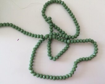 Crystal was faceted 4 mm khaki Green