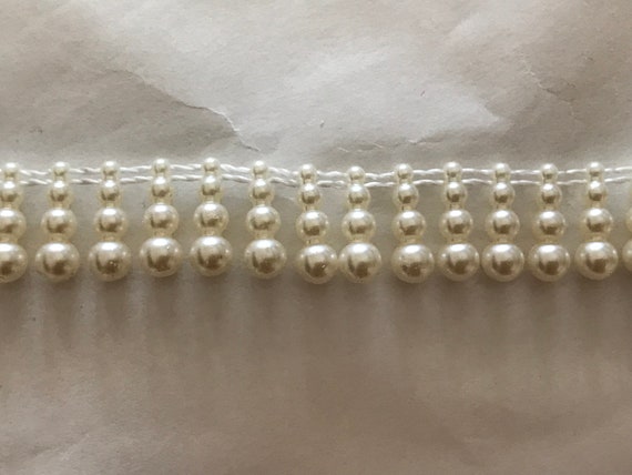 Ribbon half acrilic pearl of 2.5 cmecru color, ribbon fringe pearl
