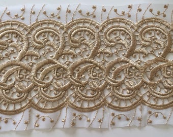 Guipure lace between two ocher color 14 cm wide