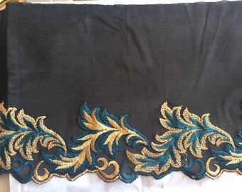 Embroidered lace on tulle black slightly spandex
