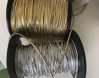Silver elastic cord, approximately 3 mm thick