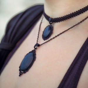 Large pendant in your desired color with colored glass stones in black, silver and bronze as cosplay jewelry or for gothic outfit