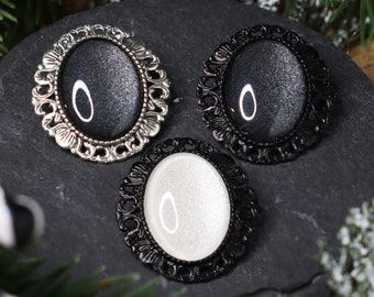 Oval brooch in your desired color made of glass stones in black, silver and bronze as cosplay jewelry and gothic gift