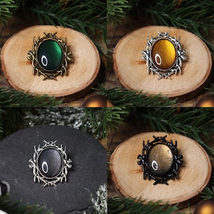 Ovale Brosche Geweih in Wunschfarbe aus Glassteinen in Schwarz Silber und Bronze als Cosplay Schmuck und Gothic Geschenk Gold