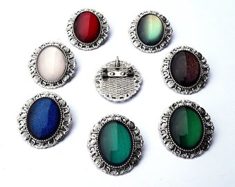 Oval brooch in your desired color made of glass stones in black, silver and bronze as cosplay jewelry and gothic gift