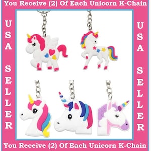 May include: Set of six unicorn keychains. Two keychains feature a white unicorn with pink, blue, and yellow accents. Two keychains feature a white unicorn with a rainbow mane and tail. Two keychains feature a white unicorn with a purple head and a rainbow mane.