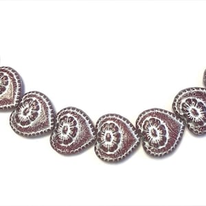 Dusty Rose Opal/Silver heart with flower. 17mm bead. About 9 beads per strand.