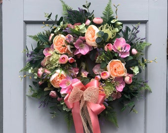 Artificial peach, pink, green door wreath