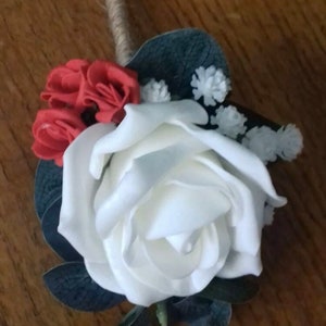 1 x Ivory foam rose button holes with red rosebuds,Gypsophila, eucalyptus and stems bound in rope