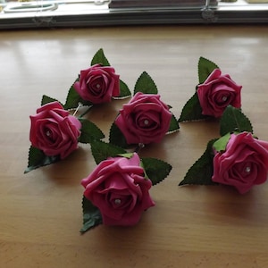 Gents hot pink foam rose buttonholes with diamante x 6