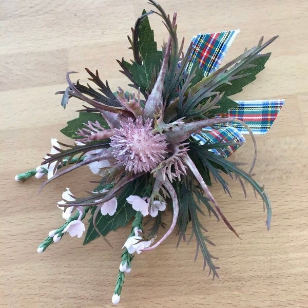 1 x Dusky pink Scottish thistle and pink heather button holes with tartan ribbon