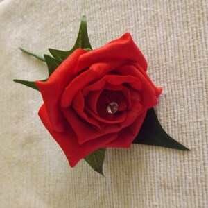 Gents red foam rose buttonhole with diamante x 1