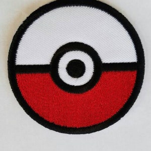 May include: A red, white, and black embroidered patch with a Pokeball design.
