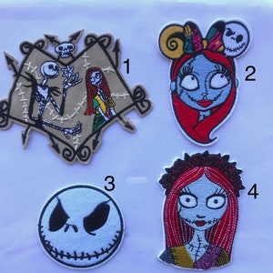 May include: Four embroidered iron-on patches featuring characters from The Nightmare Before Christmas. The first patch shows Jack Skellington and Sally holding hands. The second patch shows Sally with a Jack Skellington head as a headband. The third patch shows Jack Skellington's face. The fourth patch shows Sally with a floral crown.