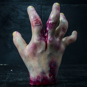 49 Blood Fake Hand Severed Royalty-Free Images, Stock Photos & Pictures